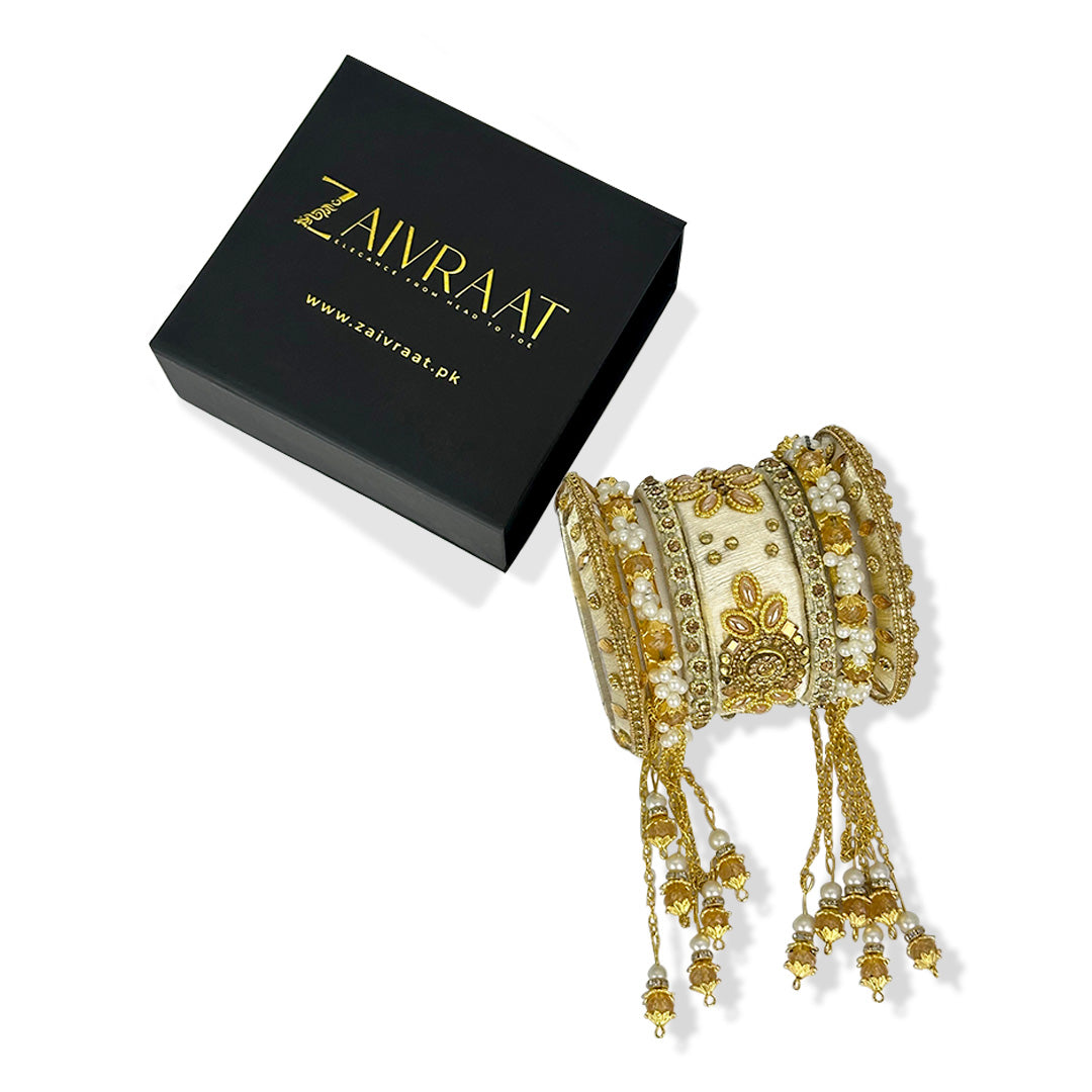 Traditional fancy bridal bangles in golden with gold lace