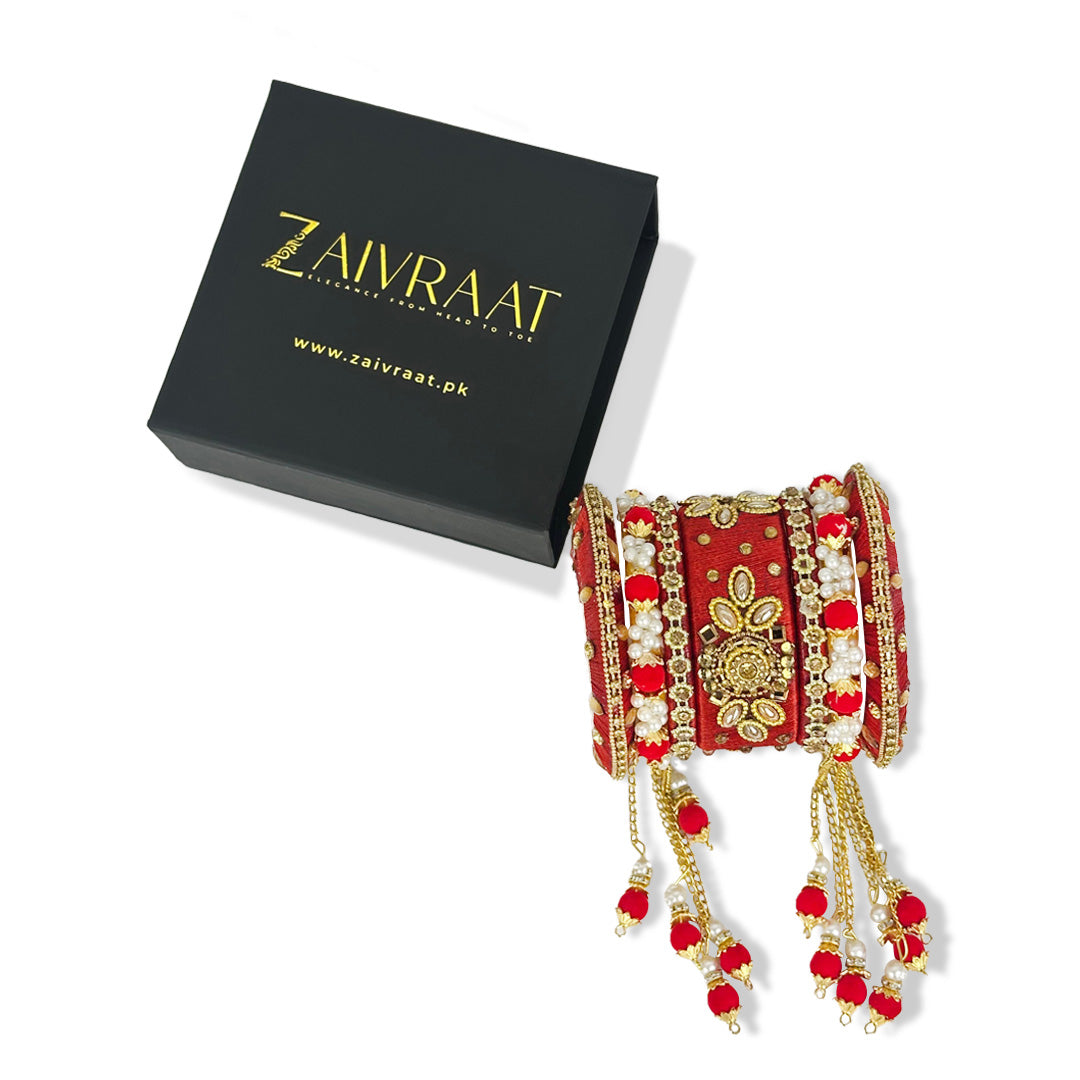Traditional fancy bridal bangles in red with gold lace